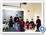 Regents' Lecturer and Processional Marshall Mousumi Roy congratulates Yejia Xu, new PhD in Optics
