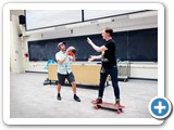 07 Demonstrating thrust with a skateboard and basketball