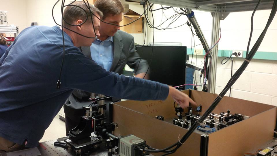 Keith Lidke, PhD, explains his current research to Senator Heinrich in the Lidke Lab Future Faces of Physics