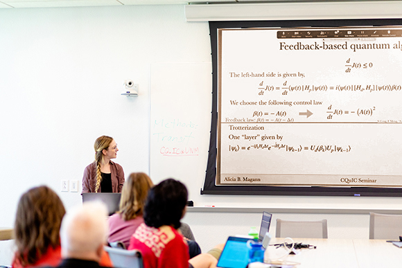 UNM Quantum faculty and students at a Center for Quantum Information and Control seminar. 2023 Photo by Hyunju Blemel.