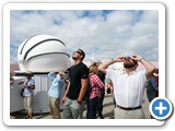 Dr. Deutsch, right, joins visitors in observing the first total solar eclipse to cross the US since 1918