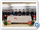 Faculty of the University of New Mexico line up for Convocation. From left to right, Professors Dunlap, Gold, Deutsch, Seidel, Morgan-Tracy, Sheik-Bahae, Becerra-Chavez, Busani, Manjavacas, and Mafi